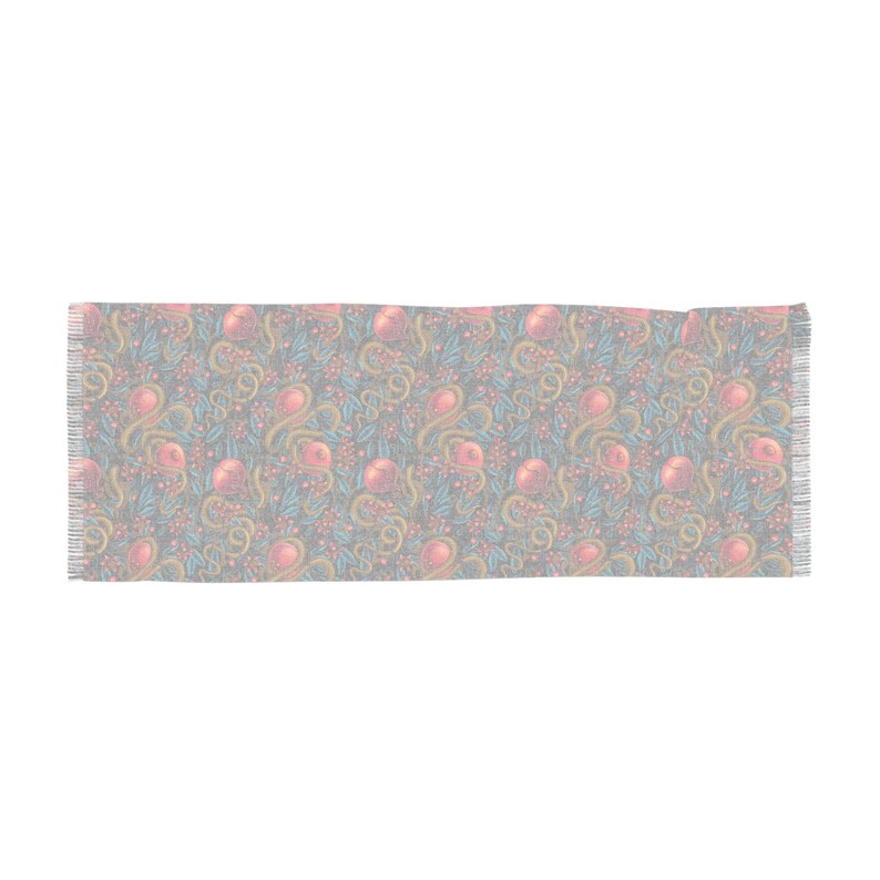 Our Pomegranate Snakes Light Scarf is transparent and printed in detail making a great shawl, hip scarf, or scarf through fall and winter. Great for fans of dark coquette, gothic femme, romantic, mystic, magic, high priestess, witchy inspired styles.