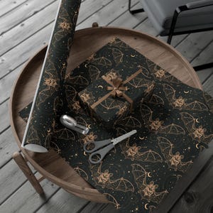 Our Celestial Bats Wrapping Paper is the cherry on top to a great gift. The perfect wrapping paper for bohemian gothic, whimsigoth, witchy, horror, dark academia, occult, Halloween themed birthday, romantic anniversary, wedding, or Christmas gifts.