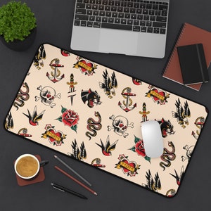 Our Tattoo Print Desk Mat is great for that extra personal touch at work or in your home office. These are the perfect addition to your retro, vintage, old school, traditional sailor tattoo, rockabilly themed gaming desk setup.