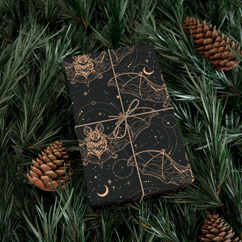 Our Celestial Bats Wrapping Paper is the cherry on top to a great gift. The perfect wrapping paper for bohemian gothic, whimsigoth, witchy, horror, dark academia, occult, Halloween themed birthday, romantic anniversary, wedding, or Christmas gifts.