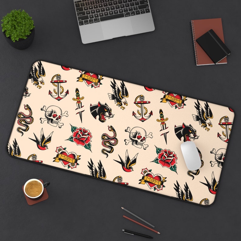 Our Tattoo Print Desk Mat is great for that extra personal touch at work or in your home office. These are the perfect addition to your retro, vintage, old school, traditional sailor tattoo, rockabilly themed gaming desk setup.