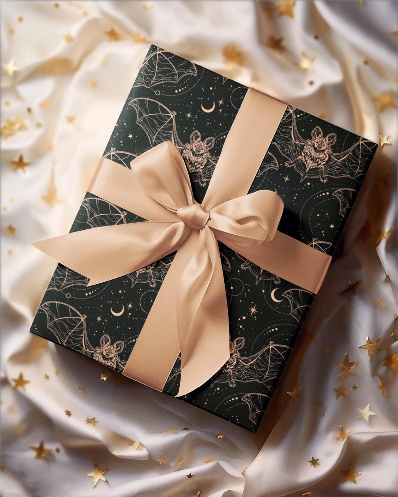 Our Celestial Bats Wrapping Paper is the cherry on top to a great gift. The perfect wrapping paper for bohemian gothic, whimsigoth, witchy, horror, dark academia, occult, Halloween themed birthday, romantic anniversary, wedding, or Christmas gifts.