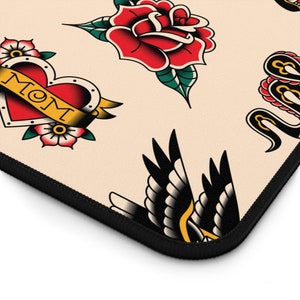 Our Tattoo Print Desk Mat is great for that extra personal touch at work or in your home office. These are the perfect addition to your retro, vintage, old school, traditional sailor tattoo, rockabilly themed gaming desk setup.