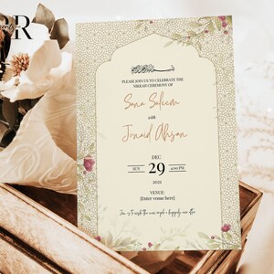 May include: A cream-colored wedding invitation with a floral design and an ornate archway. The invitation reads "Please join us to celebrate the Nikkah Ceremony of Sana Saleem with Junaid Ahsan" and includes the date "Sun Dec 29, 2021, 4:00 PM".
