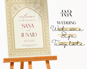 Puede incluir: Un letrero de bienvenida de boda sobre un caballete de madera. El letrero tiene un fondo crema con bordes y texto dorados. El texto dice "welcome to the wedding of Sana and Junaid" con la fecha 10.12.2021.