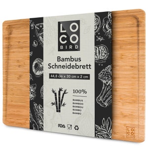 Solid bamboo cutting board with juice groove
