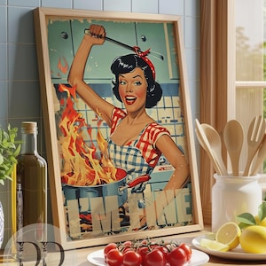 May include: A framed wall art print featuring a retro-style illustration of a person in a red and white checkered top and blue apron holding a spatula over a pot with large orange flames, with the text I'M FINE printed in large letters at the bottom.