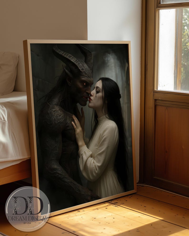 May include: A framed rectangular wall art print featuring a dark-skinned horned creature with glowing red eyes facing a person with long black hair wearing a cream-colored high-neck dress. The print includes the text DREAM DIGITAL BY LISA.