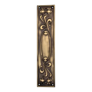 May include: An antique brass door plate with an Art Nouveau floral design. The rectangular plate features an oval centre and decorative floral and swirling patterns. It has four screw holes and a dark, aged finish.