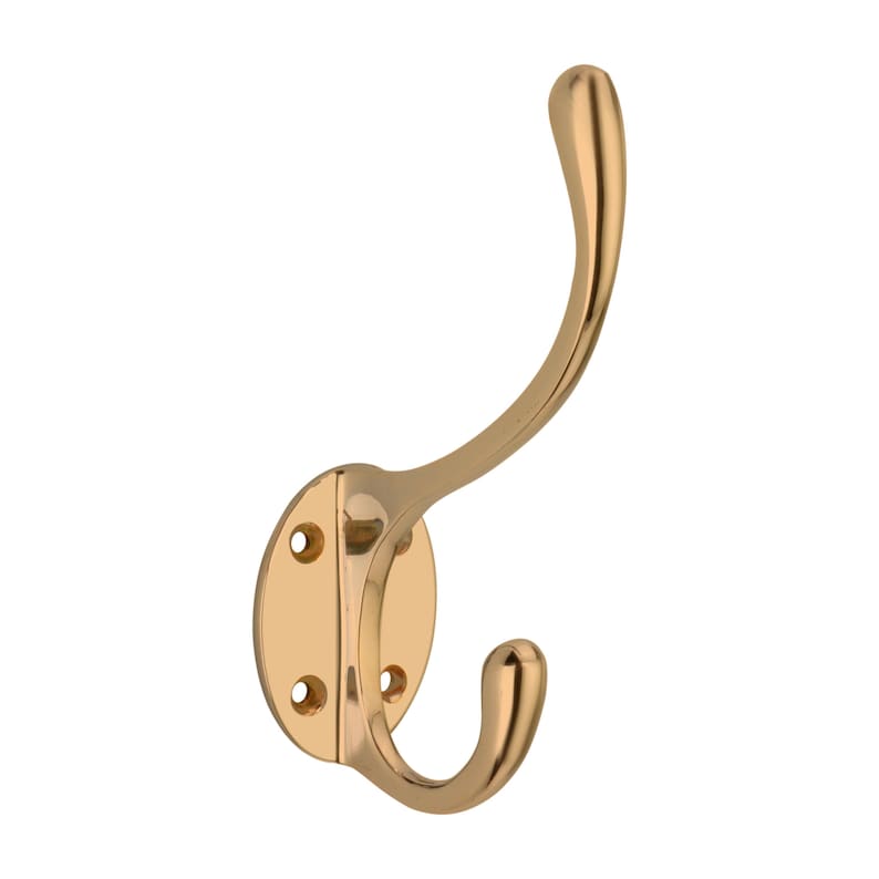 May include: A gold-colored coat hook with a curved design. The hook has a rounded top and a curved lower section, with a circular base featuring three screw holes for mounting. The metal has a polished finish, reflecting light.