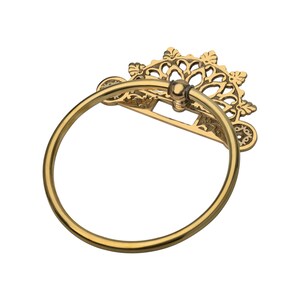 May include: A gold-colored towel ring with an ornate, openwork design. The ring is circular, and the decorative backplate features a floral pattern. The metal has a polished finish, reflecting light. The design is likely for a bathroom or kitchen.