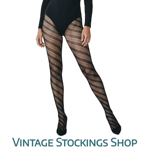 May include: Black and brown striped patterned tights. The tights have a diagonal stripe design. The image shows the tights being worn. The text at the bottom of the image reads "VINTAGE STOCKINGS SHOP".