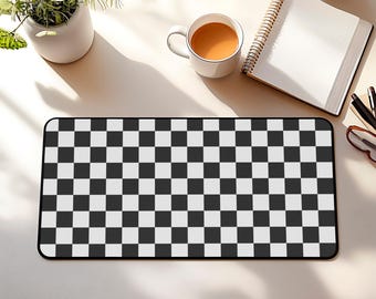 May include: A black and white checkered mouse pad. The mouse pad is rectangular and has a smooth surface.