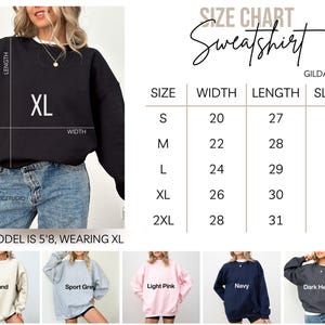 The image is a size chart for a black sweatshirt, including various sizes and corresponding measurements.
