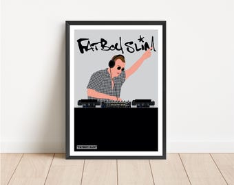 May include: A framed poster featuring a graphic illustration of a DJ wearing sunglasses and headphones, positioned behind a mixing console. The text FATBOY SLIM is written in a stylized black font at the top, with the text FATBOY SLIM in a small box below.