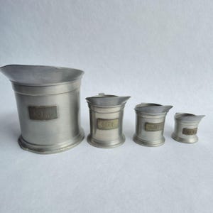 Vintage Pewter Measuring Jugs Set – 4 pieces