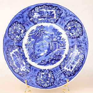 May include: A set of three ceramic mugs with a speckled, matte finish. Each mug features a different color: light blue, cream, and gray. The mugs have a simple, modern design, perfect for coffee or tea.