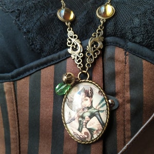 Steampunk women&#39;s necklace, glass cabochon necklace with charms