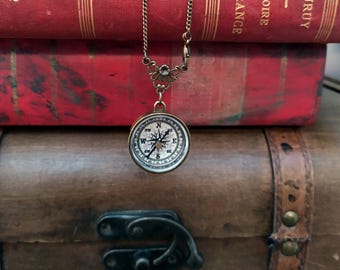 Small brass compass pendant necklace