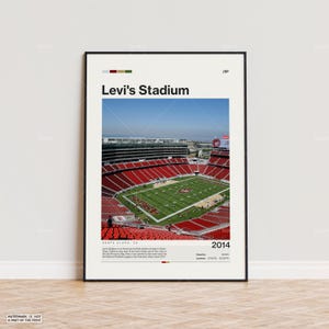 May include: An aerial view of Levi's Stadium in Santa Clara, California. The stadium is a multi-purpose stadium that is home to the San Francisco 49ers. The stadium is surrounded by a red and white seating area. The image includes the text "Levi's Stadium", "Santa Clara, CA", "2014", "Capacity: 68,500", and "Location: 37.3375° N, 122.0097° W".