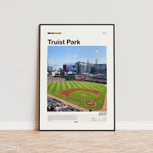 May include: A black and white poster with a photo of Truist Park, a baseball stadium in Atlanta, Georgia. The poster includes the text "Truist Park", "Atlanta, GA", "2017", "Capacity: 41,084", and "Location: 33.7517° N, 84.4037° W".