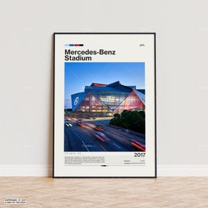 May include: A black and white poster with a photo of Mercedes-Benz Stadium in Atlanta, Georgia. The stadium is a multi-purpose stadium that opened in 2017. The poster also includes the stadium's name, location, and year of opening.