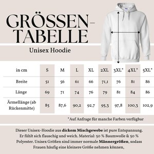 May include: White unisex hoodie with a size chart in centimetres. The chart displays measurements for width, length, and sleeve length, ranging from size S to 5XL. The text on the chart is in German.