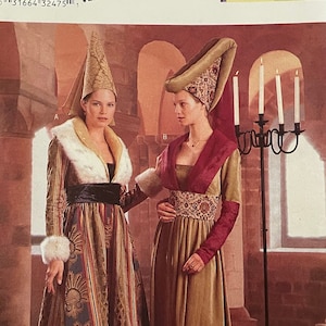 Puede incluir: Patrón de costura Butterick 6751 con trajes históricos medievales. La imagen muestra a dos mujeres con vestidos largos y tocados elaborados. El texto "FINAL SALE - NO RETURNS" es visible en el sobre.