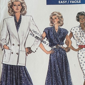 May include: A sewing pattern for a dress with three different styles. The pattern is from Vogue Patterns and is size 8. The pattern is rated easy to sew.