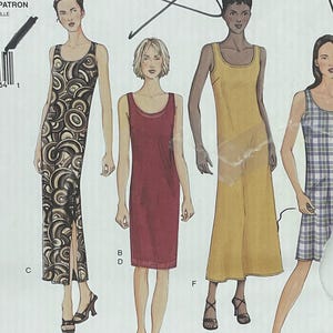 May include: Vogue Basic Design sewing pattern featuring multiple dress styles. The pattern includes a variety of designs, including a long dress with a swirl pattern, a red dress, a yellow dress, a plaid dress, and a striped dress. The pattern number is 2562.