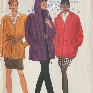 May include: A vintage Butterick sewing pattern envelope with illustrations of three jacket designs. The envelope has the text "Butterick" at the top and the size 12-14-16. The jackets are in shades of orange, purple, and red.