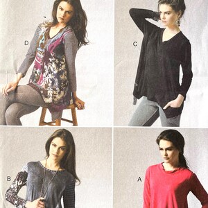 Peut inclure: Un patron de couture Butterick, B5925, présentant quatre modèles de tuniques. Le patron comprend différents styles, avec des manches longues et des encolures en V. Le patron célèbre le 150e anniversaire de Butterick.