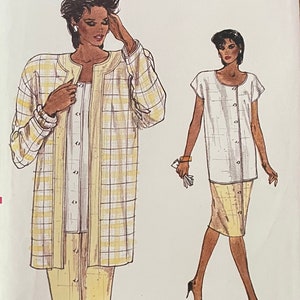 May include: A sewing pattern for a plaid jacket and skirt set. The pattern is for sizes 8, 10, and 12. The pattern is from Very Easy Very Vogue and the pattern number is 9553.
