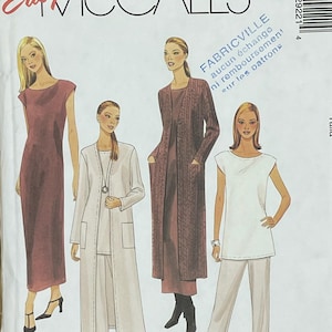 May include: A white sewing pattern envelope featuring illustrations of four women in various outfits. The envelope has the text "Easy McCall's" in red and black. The pattern number is 2922, with size information.