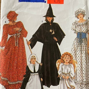 May include: Simplicity sewing pattern number 219, for making five Halloween costumes: a witch, a pilgrim, an angel, a pioneer woman, and a colonial woman. The pattern is priced at £4.75.