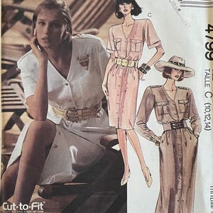 May include: Vintage McCall's sewing pattern featuring illustrations of button-down dresses. The pattern includes a woman in a white dress, and two illustrations of dresses in pink and tan. The pattern is size C (10,12,14).