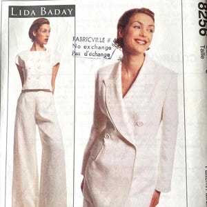 May include: McCall's sewing pattern featuring a Lida Baday design. The pattern includes a white blazer and matching pants. The size is 8.