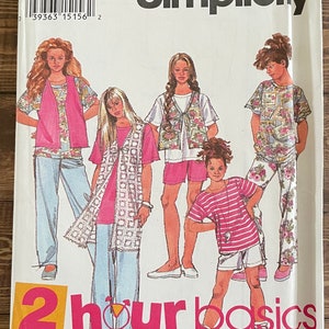 May include: Simplicity sewing pattern number 8896 for girls' clothing. The pattern includes instructions for making a vest, a top, a shirt, and trousers. The pattern is for sizes 7, 8, 10. The pattern is titled "2 hour basics".