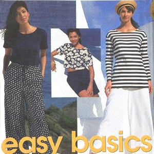 May include: Simplicity sewing pattern 3977, with designs for easy basics. The pattern shows a woman in a navy top and polka dot trousers, a floral top and black shorts, and a striped top and white trousers. Measurements are in cm.
