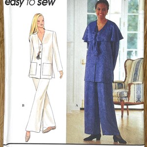 May include: Simplicity sewing pattern 8810, featuring two women's suit designs. The pattern includes the text "easy to sew" and the brand name "Simplicity". The pattern shows a white suit and a blue suit.