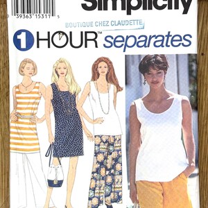 May include: Simplicity sewing pattern featuring women's separates. The pattern includes designs for tops, dresses, and pants. The cover art showcases illustrations of the finished garments, with the text "1 HOUR separates".