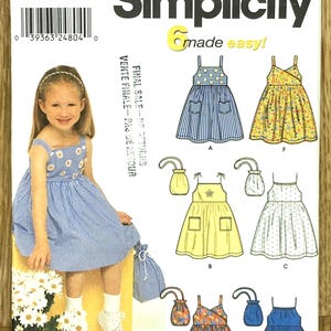 Simplicity 9647, Storlek (3-8), Barnklänning med handväska, 2001 Oklippt sömnadsmönster