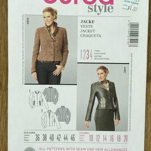 Op de afbeelding: Een Burda Style naaipatroon met jasontwerpen. Het patroon bevat afbeeldingen van afgewerkte jassen, maattabellen in Amerikaanse en Europese maten en de tekst "JACKE VESTE JACKET CHAQUETA".