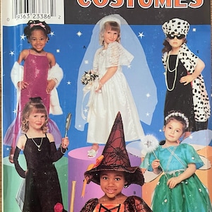 May include: Simplicity Costumes sewing pattern number 0626 for sizes 3, 4, 5, 6, 7, and 8. The pattern includes five different costumes: a bride, a witch, a fairy, a dalmatian, and a glamorous dress. The pattern is illustrated with five children wearing the costumes.