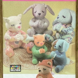 May include: Simplicity sewing pattern 4544 with various stuffed animal designs. The pattern includes instructions for making a bear, cat, bunny, and dog plush toys. The pattern is one size and includes the Longia Miller Design logo.