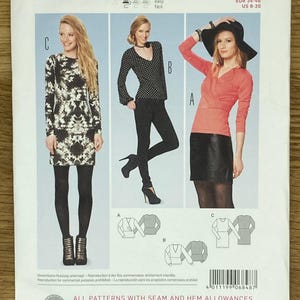 May include: A sewing pattern package labeled "burda young 6848" featuring three shirt designs. The package includes images of the finished garments, with sizes EUR 34-46 and US 8-20. The text on the package includes "Shirt, T-Shirt, Camisa".