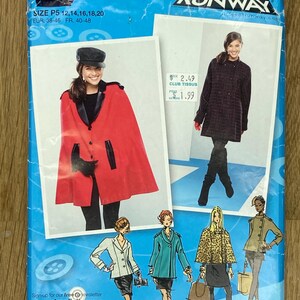 May include: A Simplicity Project Runway sewing pattern package. The package is blue and features images of women wearing coats and capes. The package includes sizing information and the website address.