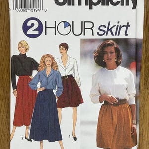 May include: Simplicity sewing pattern number 8069 for a 2-hour skirt. The pattern includes instructions for three different skirt styles: a red skirt, a blue skirt, and a brown skirt.