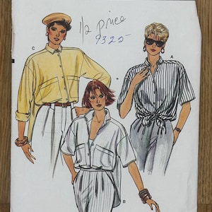 May include: A sewing pattern for three different styles of shirts. The pattern is for sizes 8-10-12. The pattern is called "Very Easy Very Vogue" and the pattern number is 9325.