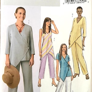 May include: Butterick B4238 sewing pattern featuring wrap tops and pants. The pattern includes illustrations of various outfits, including a light blue wrap top with matching pants, a striped wrap top with lavender pants, and a yellow wrap top with yellow pants.